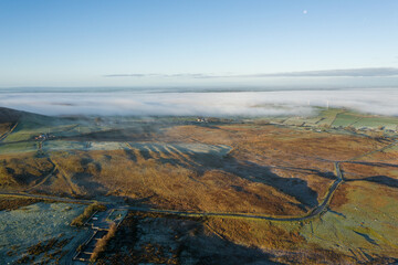 Fototapeta na wymiar aerial view of foggy winter countryside morning, Northern Ireland