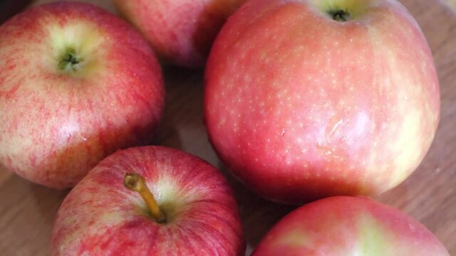 Ligol and gala apples, fruits close-up. Video with rotating red apples.
