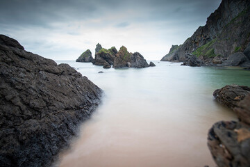 Sunset in Laga beach,Urdaibai nature reserve Basque country, Spain. Beautiful beach for surfing and bathing