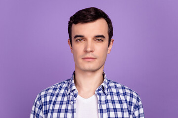 Photo of young handsome guy serious boss leader chief programmer isolated over violet color background