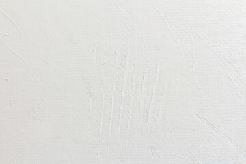 Textured white wall covered with acrylic paint as a background