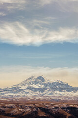 Snow covered Elbrus in autumn. the Bermamyt Plateau. Russia.