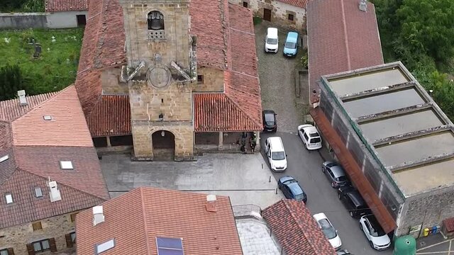 aerial footage of a traditional rural village in the basque country countryside