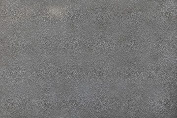 Fototapeta na wymiar Uniform gray rusty concrete texture. Macro. Top view.