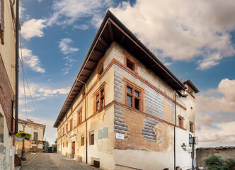 Fototapeta na wymiar Saluzzo, Cuneo, Italy - October 19, 2021: Casa Cavassa (16th century) is home to the Civic Museum of the city of Saluzzo in via San Giovanni