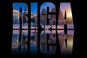 Riga text composed of photo of famous House of the Blackheads and Roland's Statue on black background with text reflection in water. Sunset over covered in snow Riga Town Hall Square in winter, Latvia