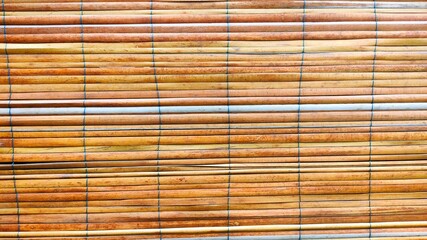 Curtains made of woven dried sago palm bark