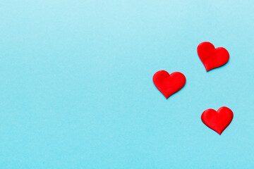 Valentine day background with red hearts, top view with copy space
