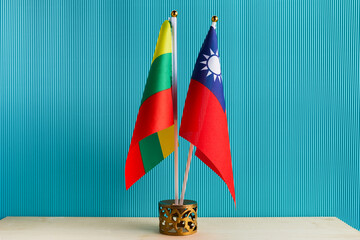 Flag of Taiwan and Lithuania on aqua background