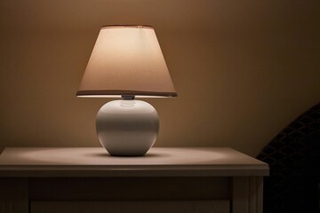 Lamp on a nightstand dim light - 474202757