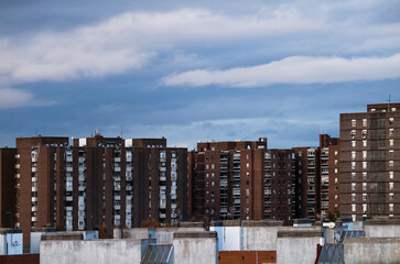 Residential buildings of Madrid, Spain, against cloudy sky