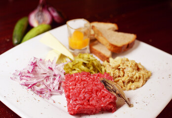 Beef tartare with onion and egg