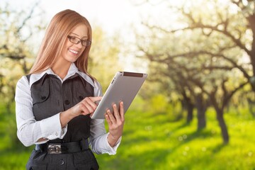 Fototapeta premium Smart young girl teenager student using digital laptop, surfing Internet,