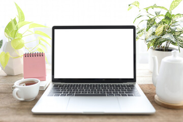 Fototapeta premium Laptop and coffee cup and mini calendar