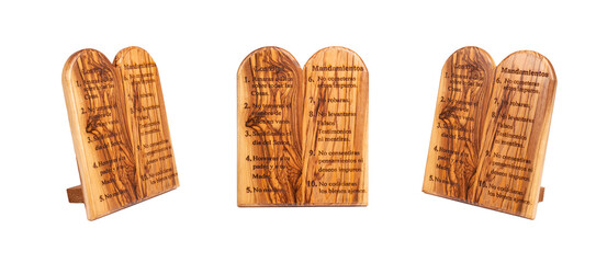 Set of two wooden tablets engraved with the Ten Commandments isolated on white background.