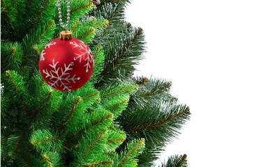 Christmas decoration hanging on a green Christmas tree.