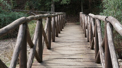 a footbridge next to the Sentiero natura, the hiking trail of the Parco dei Sette Fratelli, Sardinia, in the month of October