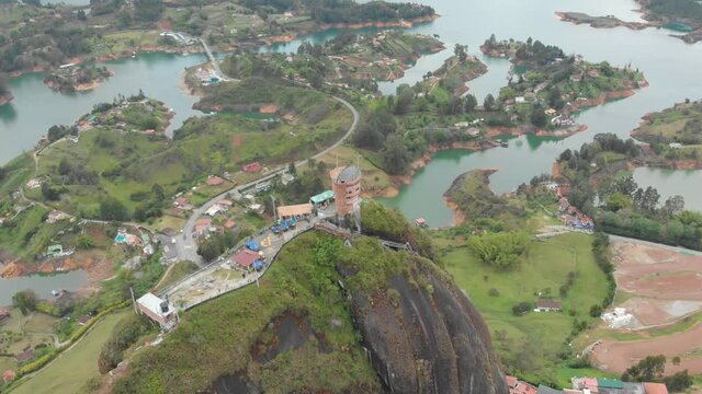 Guatape Rock Lookout Point Piedra Del Penol in Colombia - aerial drone shot