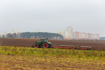 A tractor with a large double plow