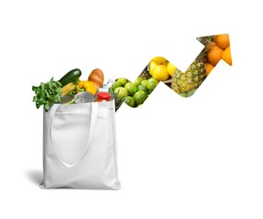 Rising grocery prices and surging cost concept and the rise of food costs with an arrow