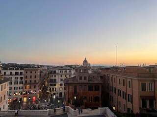 Naklejka premium view of the city of Rome at sunset