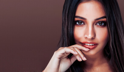 cute happy young indian woman in studio close up smiling, fashion beauty