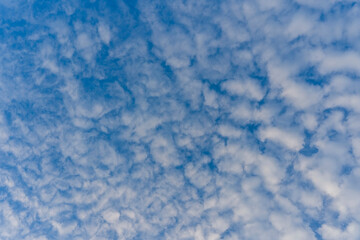 Fototapeta na wymiar White clouds on a blue sky background