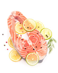 Sliced piece of fish. Steak of red fish on white background