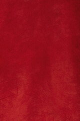 Vertical red suede background. Genuine leather, suede.