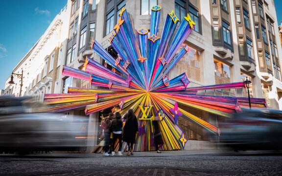 Yves Saint Laurent, Bond Street, London. Abstract Blur Of Shoppers Passing The Exclusive Fashion Store In The Affluent Shopping District.