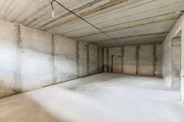 Russia, Moscow- May 06, 2020: interior rough repair for self-finishing. interior decoration, bare walls of the premises, stage of construction