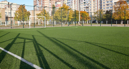 Lawn field for playing football. Close-up of soccer field with green grass