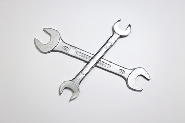 Two wrenches isolated on a white background.