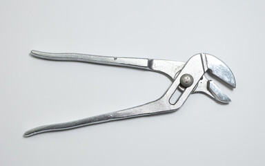 Pliers close up isolated on white background.