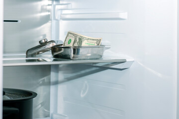 dollar inside a fridge