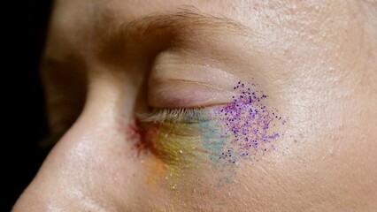 Closed eyes of gay lesbians with rainbow makeup. Albino woman girl with acne celebrates New Year. Diversity of the person in the day of dignity