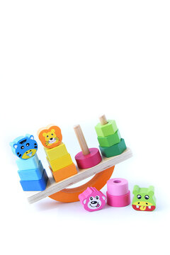 Balancing toy for children. Wooden kid's educational in Montessori style game with weight. Balancing animals plaything.
