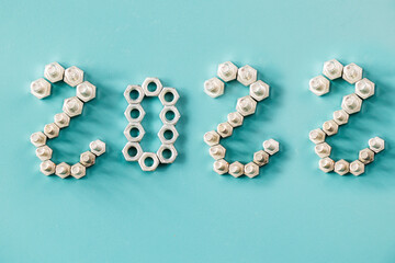 2022 New year numbers with bolts and nuts, building materials