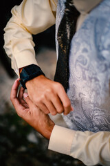 Man's watch on hand. Wedding ceremony	
