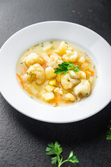cauliflower soup vegetables first course vegetable broth healthy meal diet snack on the table copy space food background rustic. top view keto or paleo diet veggie vegan or vegetarian food no meat