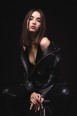 Fototapeta na wymiar Fashionable woman with perfect skin on black background