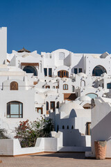 Fototapeta premium White wall buildings and stairs on the street in resort town Sharm El Sheikh, Egypt