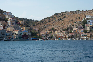 Fototapeta na wymiar View of beautiful bay with colorful houses on the hillside of th