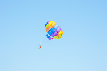 Two person enjoying the Parasailing at Akti Kanari Beach Greece