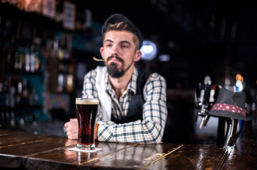 Bartender creates a cocktail on the taproom