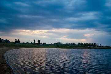 Obraz premium sunset on the river