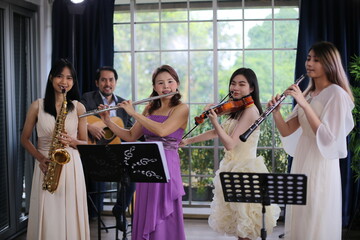 classic musical song student are learning to play a music instrument in sound studio musician class