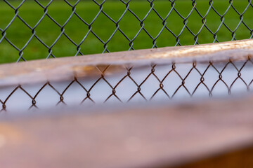 chain linked fence reflection 