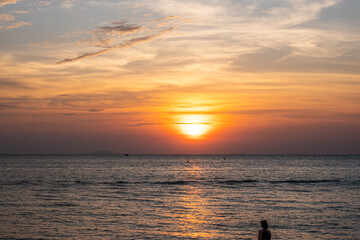 Naklejka na ściany i meble Beautiful sunset at the beach. Pattaya, Thailand.