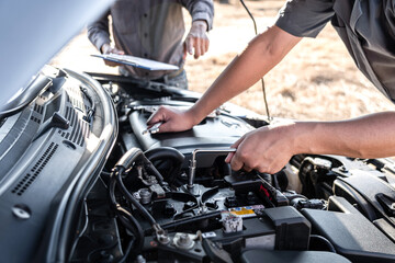 Technician team working of car mechanic in doing auto repair service and maintenance worker repairing vehicle with wrench, Service and Maintenance car check